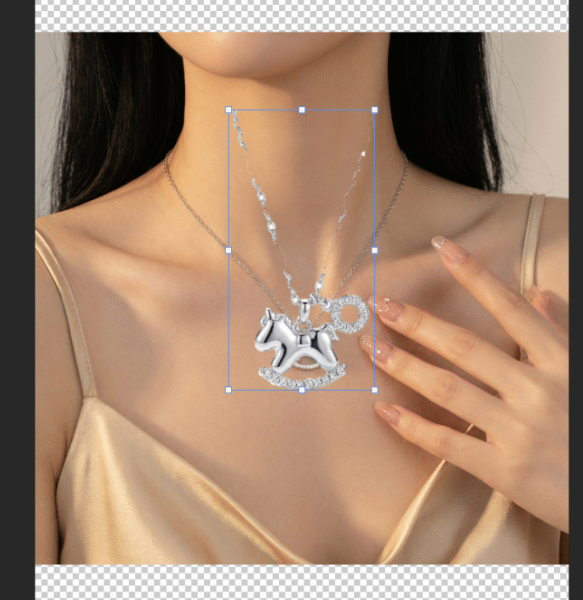 Use the Move Tool (V) to drag the necklace to the model image. 