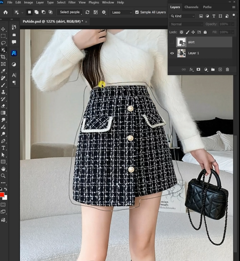 Open both your model photo and the new skirt image in Photoshop